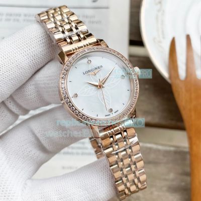 Omega Replica Ladies Watch White Dial Diamonds Bezel Yellow Gold Strap 30mm